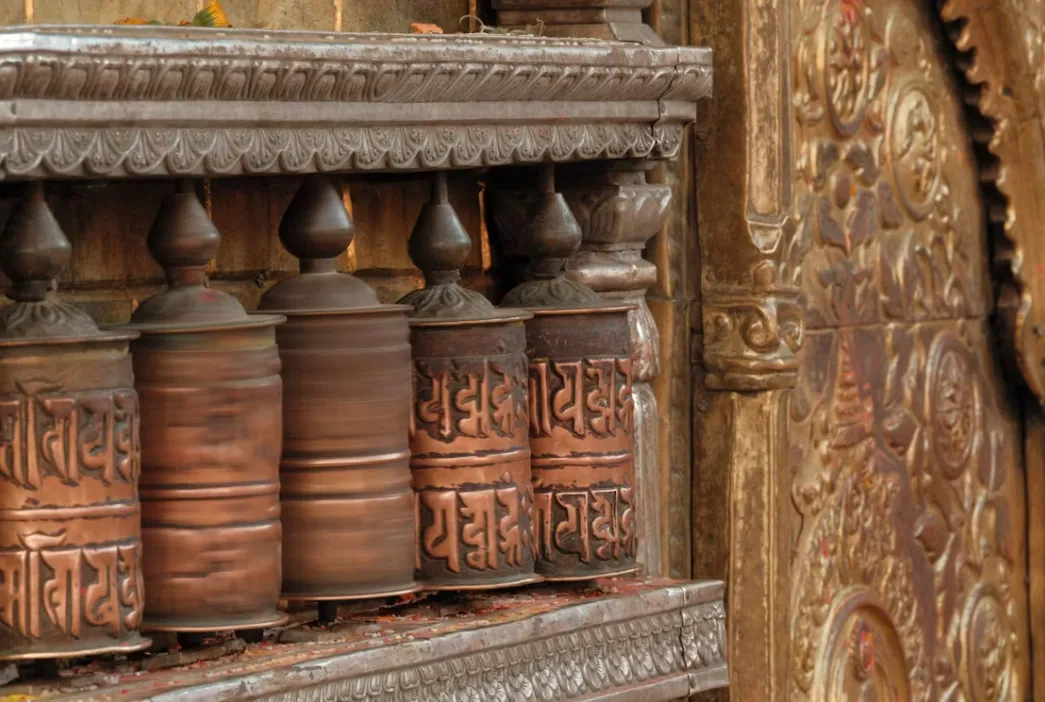Tibetan Buddhist prayer wheels at a Himalayan monastery used for meditation practice