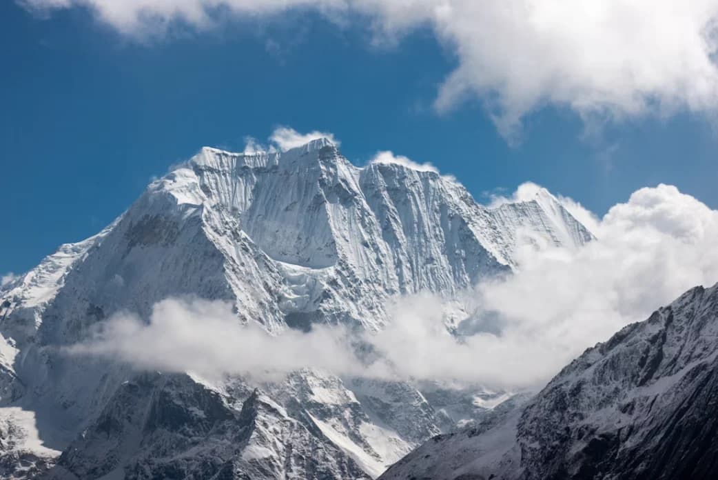 Manaslu Circuit trek with the majestic Mount Manaslu rising above remote mountain trails, Nepal