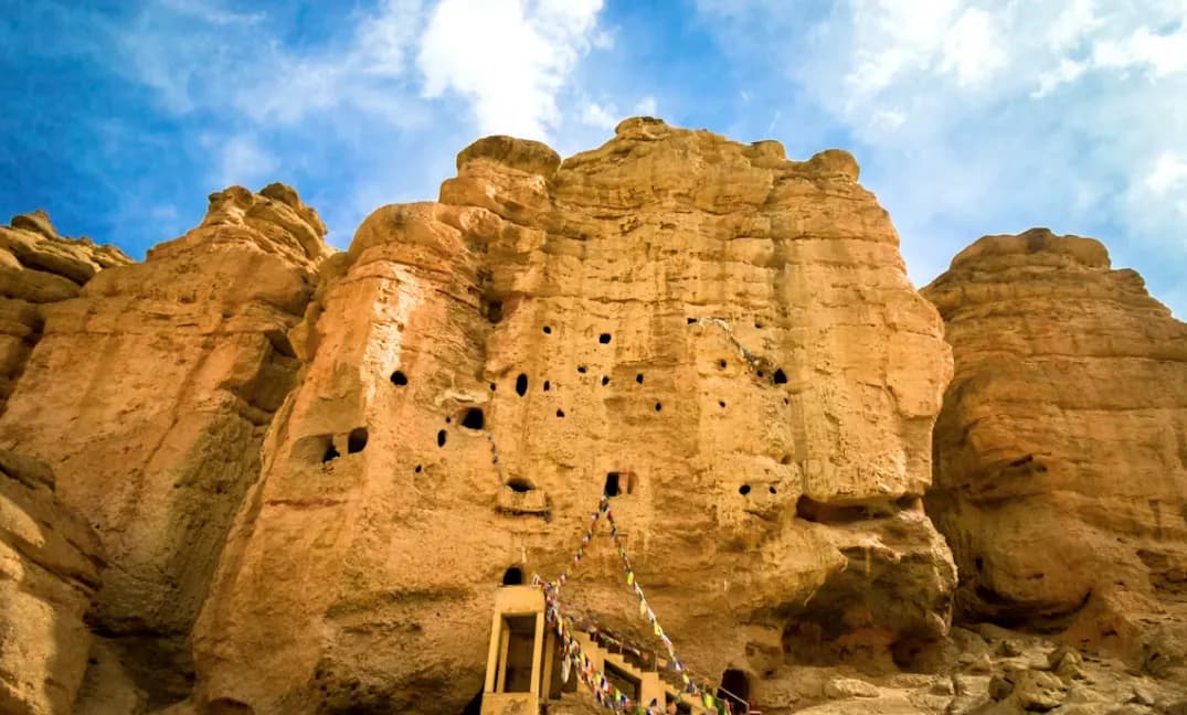 Ancient cave monasteries carved into cliff faces in Upper Mustang, Nepal