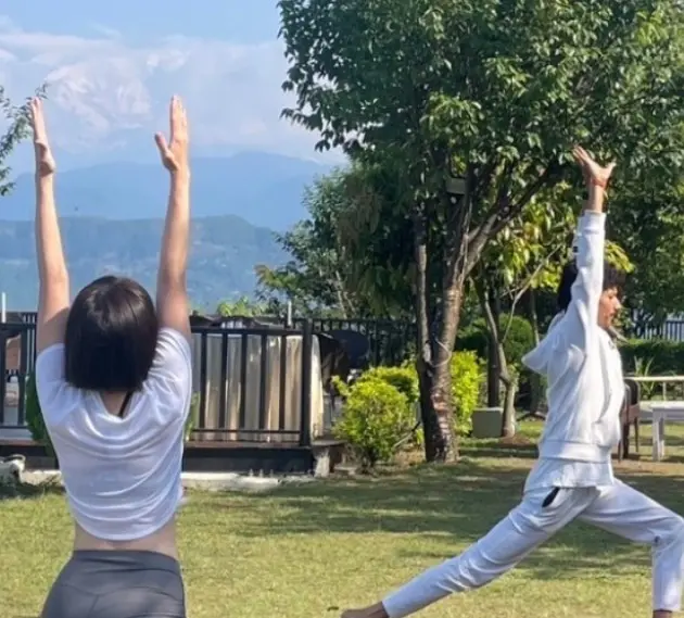 Peaceful wellness retreat setting in the Nepali countryside with mountain views