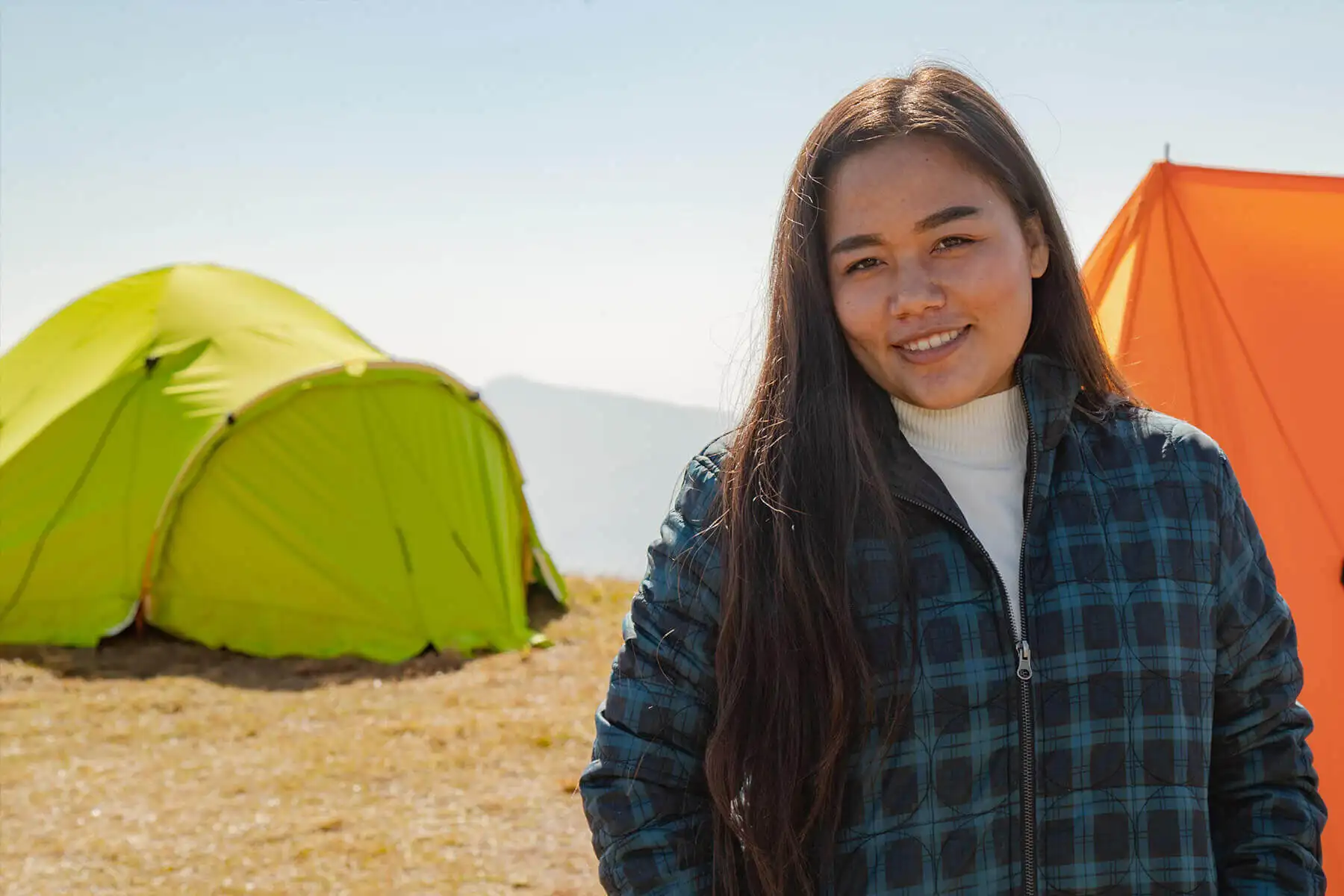 SASANE Sisterhood survivor guides leading travelers through scenic mountain trails in Nepal
